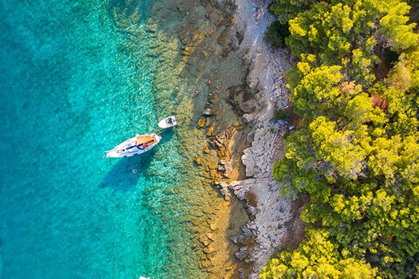 Boats in clear blue water near Croatia