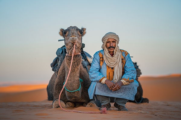 A man and a camel in Morocco