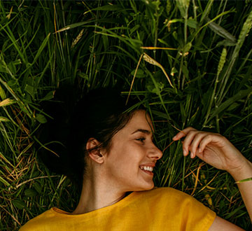 Girl lying in the grass